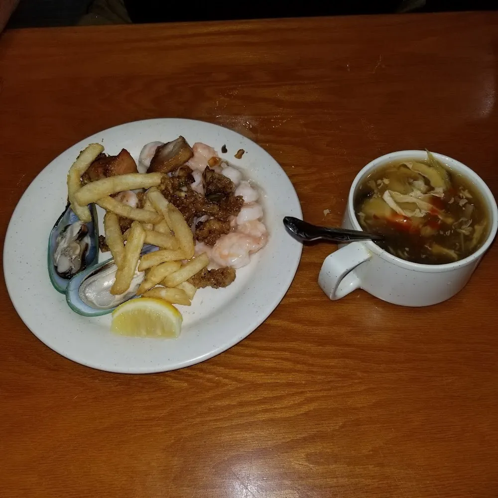 Mariscos Papas Fritas Maduros